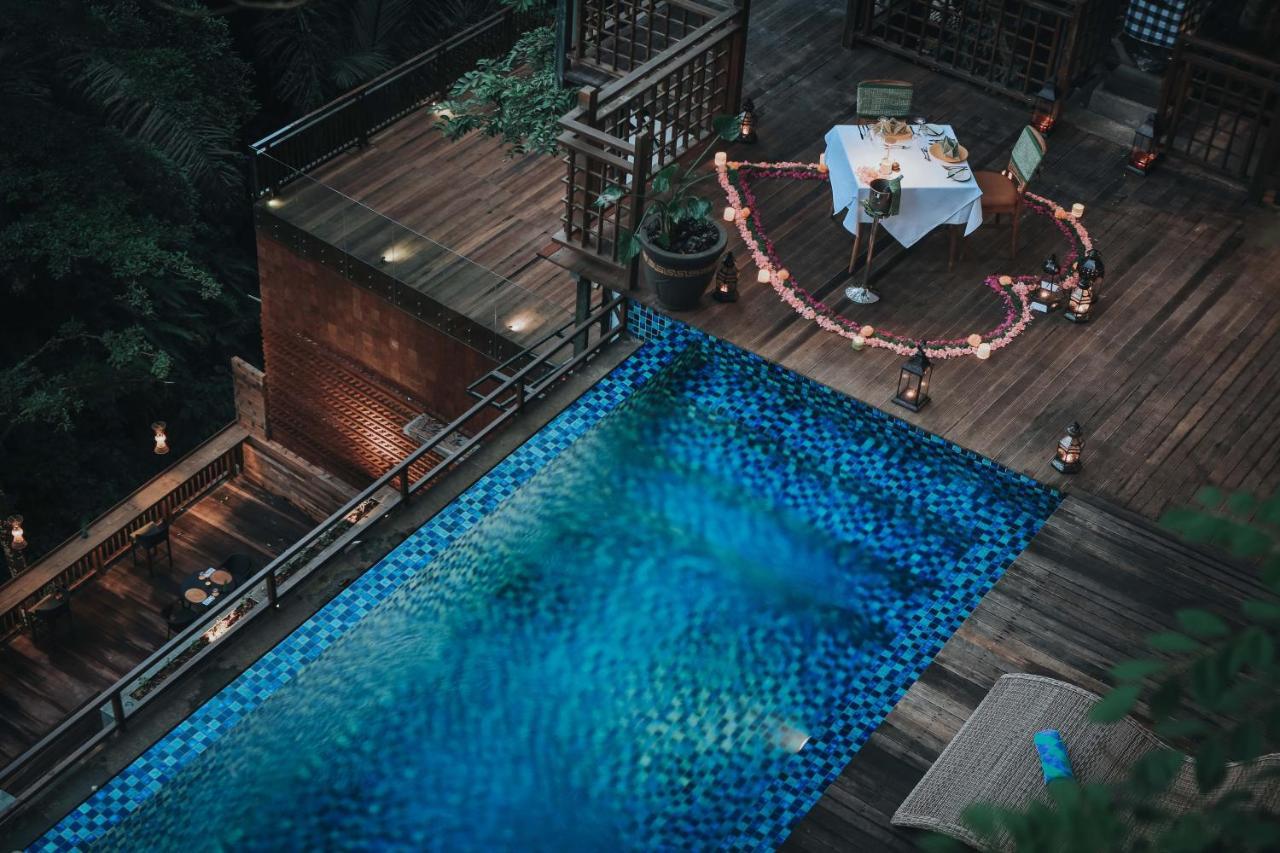 The Sebali Resort Убуд Экстерьер фото The swimming pool at the hotel