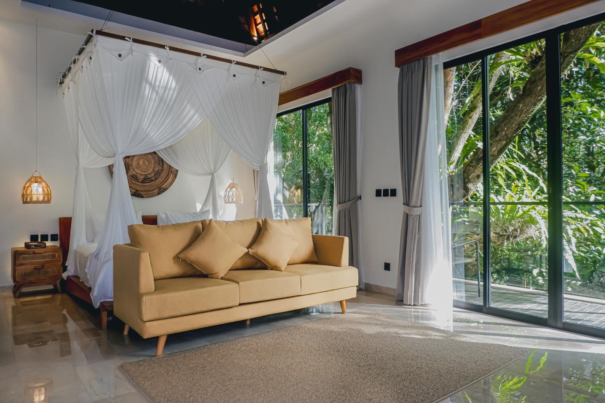 The Sebali Resort Убуд Экстерьер фото A bedroom at the resort