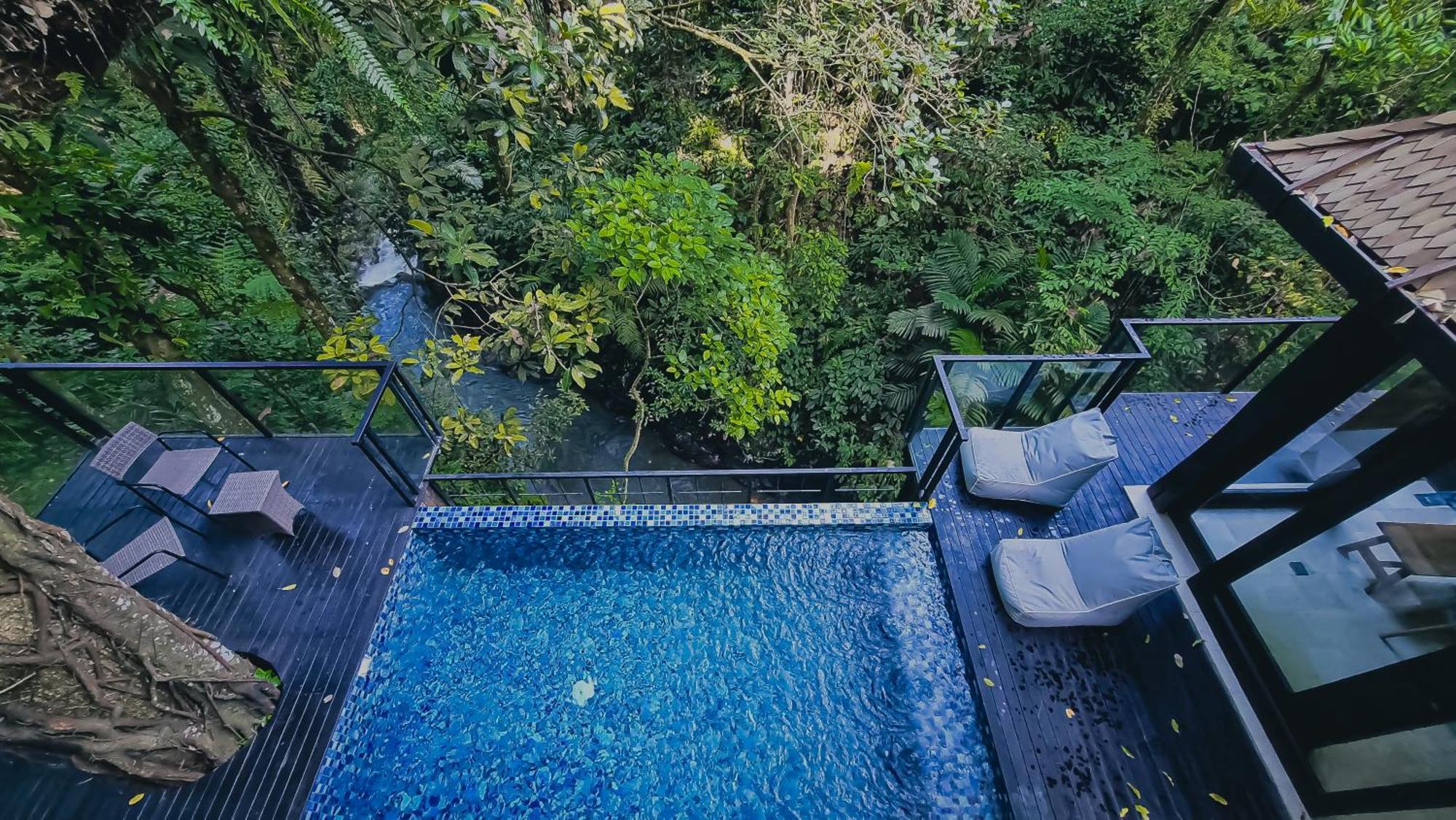 The Sebali Resort Убуд Экстерьер фото The swimming pool at the resort