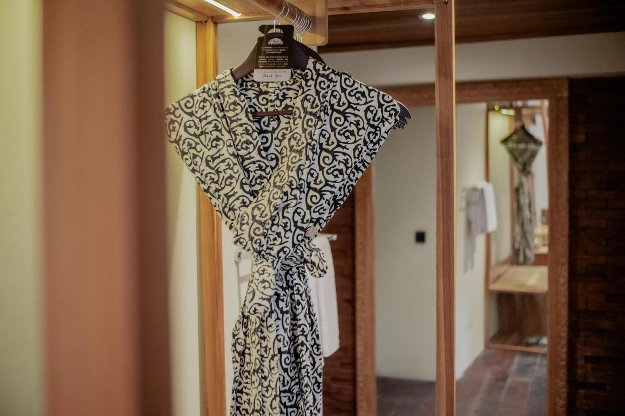 The Sebali Resort Убуд Экстерьер фото A bathrobe hanging on a hanger