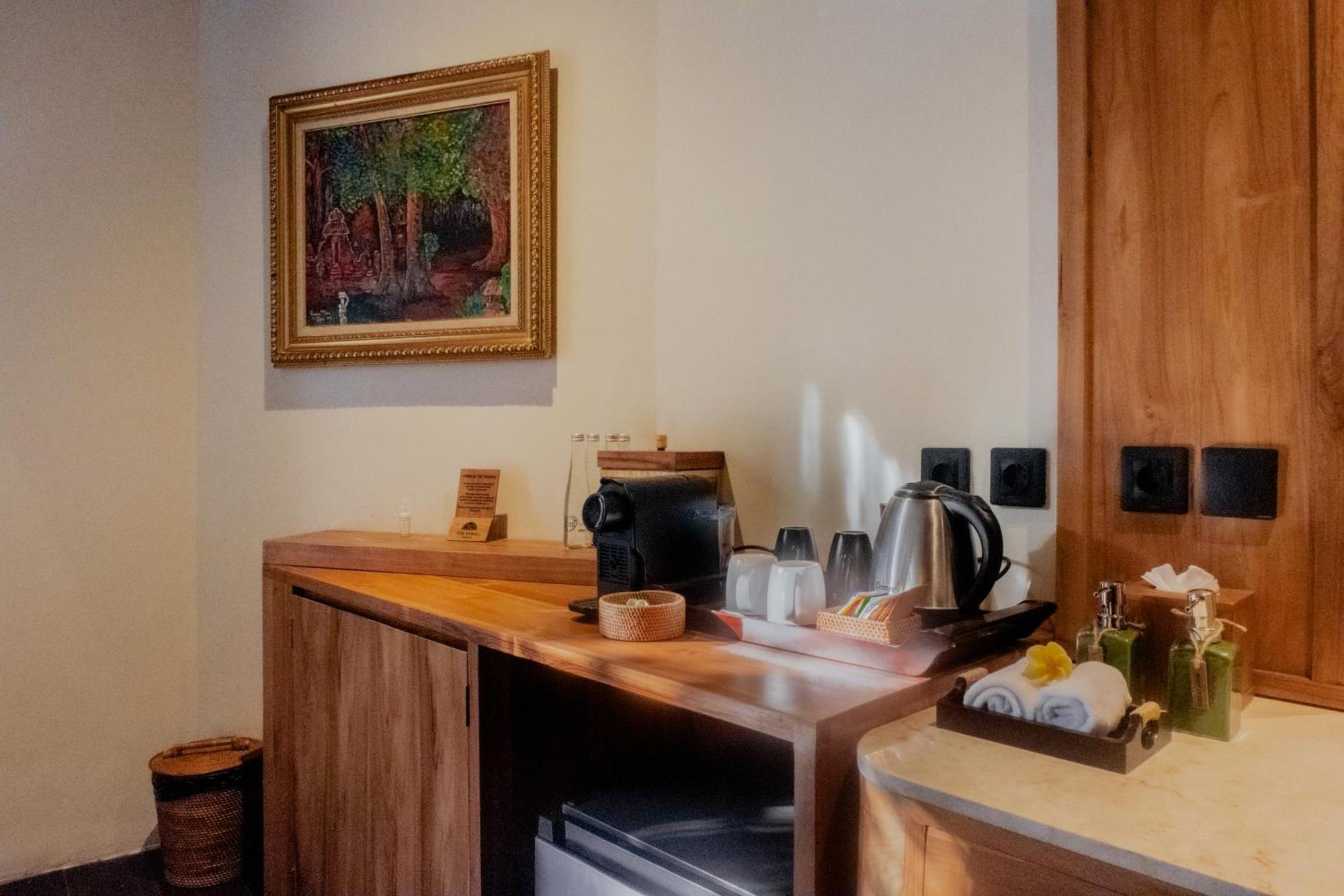 The Sebali Resort Убуд Экстерьер фото A Nespresso machine in a hotel room