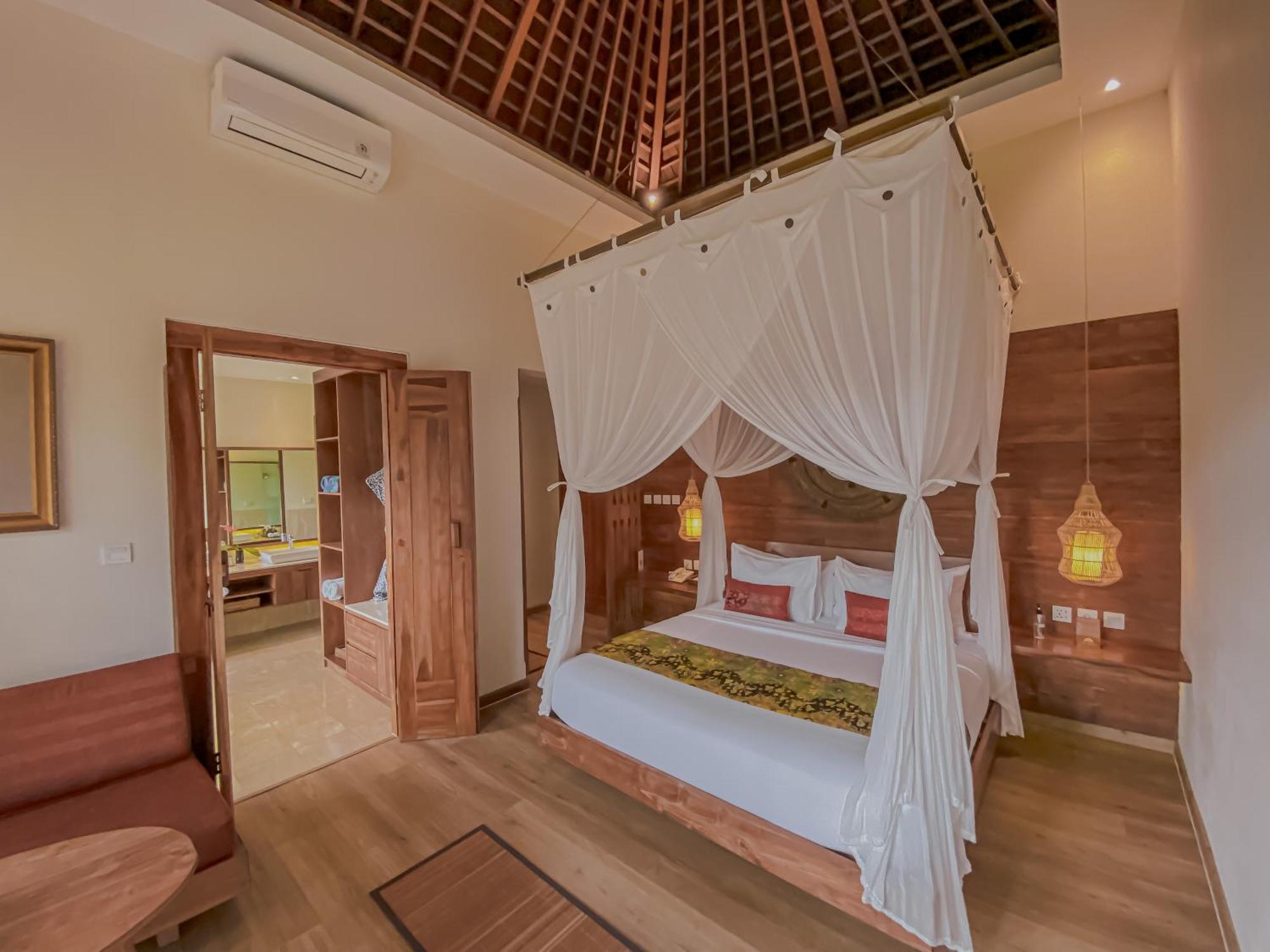 The Sebali Resort Убуд Экстерьер фото A bedroom at the resort